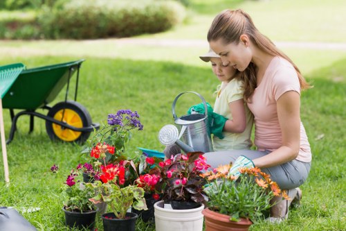 Crew measuring volume of garden waste for cubic-yard pricing